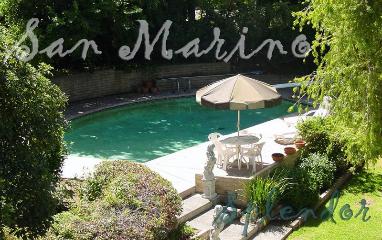 This gorgeous and spacious, traditional ranch style home is nestled on almost half an acre in the heart of San Marino. The private circular driveway in front of the 3,079 square foot home greets you with lovely oak trees and greenery. In walking distance to San Marino High School, this luxury one-story estate features a beautifully designed open floor plan, which includes a large kitchen and breakfast nook, as well as a separate formal dining room. The dramatic living room with new hardwood floors and high wood beam ceiling is an entertainer�s delight, along with its Italian marble fireplace. Many cozy winter nights were shared here. Singing carols, snuggling around the fire and playing tunes at the grand piano. The private and inviting back yard with large covered patio and pool is perfect for sultry summer moonlight swims! Closets and storage for days! Bonus room with fireplace and built-ins, large laundry room, office, basement and more! Numerous features and upgrades. Enjoy your best holidays ever in what could be your new luxury home!